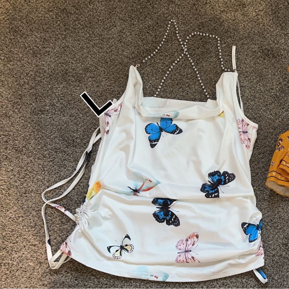White butterfly top